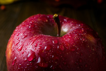 wet red delicious apple close-up,Fresh juicy red apples, close up,macro,Water drops on a red apple,fruit concept