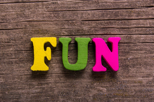 fun word made of wooden letters