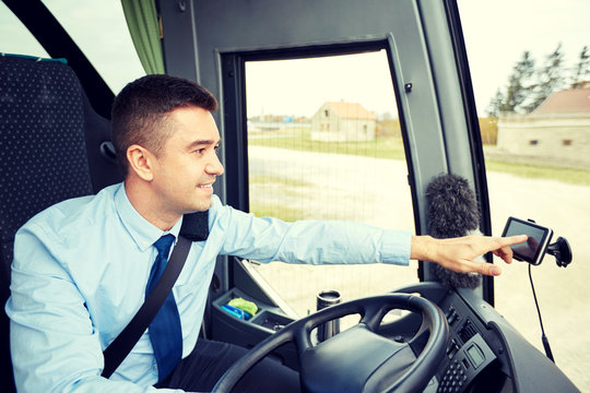 Bus Driver Entering Address To Gps Navigator