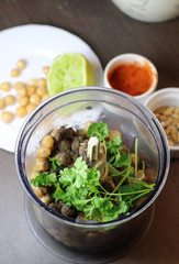 Hummus preparation with parsley and chickpeas