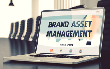 Brand Asset Management on Laptop in Conference Hall. 3D.