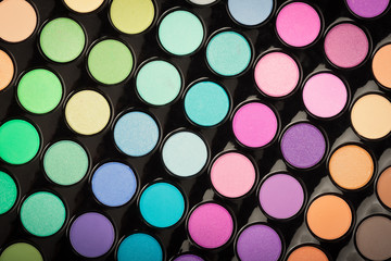 Colorful makeup powder texture as background