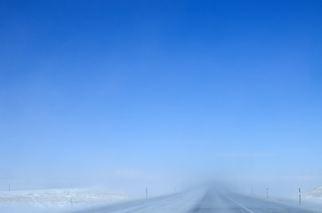 blowing snow on highway