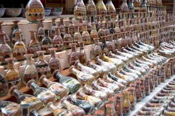 Bottiglie con sabbia