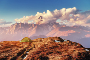Fototapeta premium Tent green spread out on the pass Goulet. Georgia, Svaneti