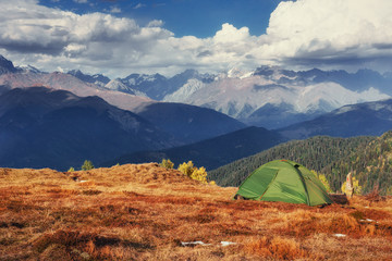 Tent green spread out on the pass Goulet. Georgia, Svaneti