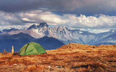 Tent green spread out on the pass Goulet. Georgia, Svaneti