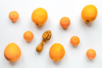 fresh orange fruit on white background top view pattern