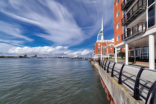 Gunwharf Quays is a former military facility in Portsmouth, UK which is now converted in to luxury homes and apartments, as shown. Portsmouth Harbour is to the left.