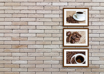 Wooden frames on decorative bricks wall with coffee motif pictures. Interior decor idea for street cafe or coffee shop