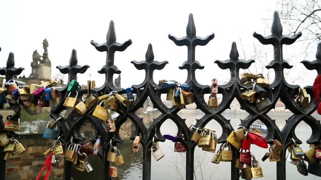 Charles Bridge and Love locks  in Prague  PRAGUE, CZECH REPUBLIC - Feb 7, 2017