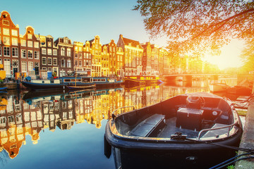 Canal at sunset. Amsterdam is the capital