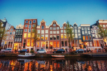 Fototapeta premium Fantastic sunset that shines on buildings