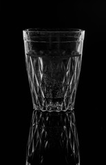 water on a glass on dark background.