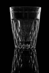 water on a glass on dark background.