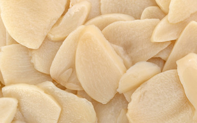 Close view of sliced garlic.
