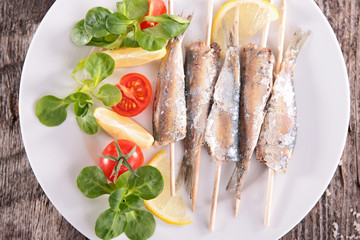fried sardine and salad