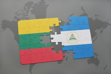 puzzle with the national flag of lithuania and nicaragua on a world map