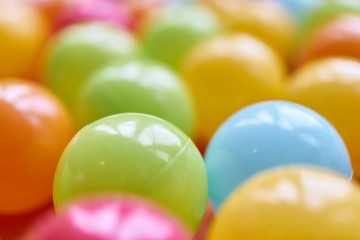 Coloured plastic balls close up