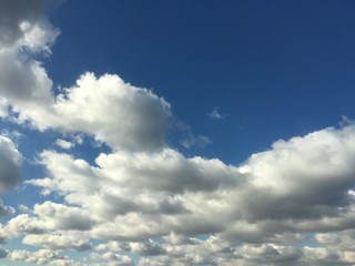 Naklejka na ściany i meble winter day clouds on blue sky