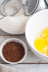 flour, cocoa, eggs, baking dishes
