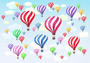 Hot air balloons with clouds on blue sky background