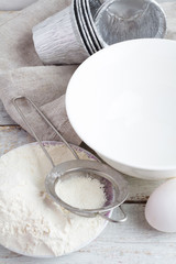 Fototapeta na wymiar utensils and ingredients for baking closeup