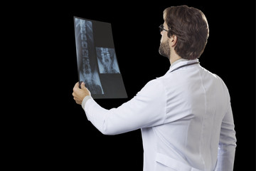 Male doctor in black background.