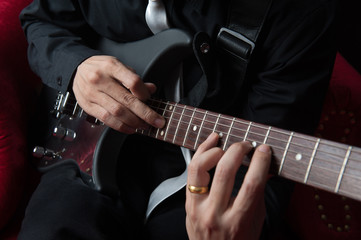 Fototapeta na wymiar musicians playing guitar.
