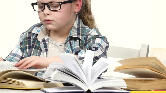 Girl is looking for information and records it. White background. Close up