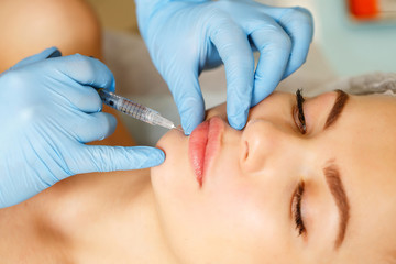 Injections of the lips. Adjustment of the lower lip form. Injection of beauty. Spa. Facial Rejuvenation. Lip augmentation.