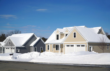Fototapeta na wymiar houses in residential community after snow in winter