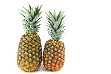  two fresh pineapples isolated on white background