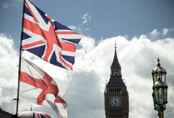 Fototapeta na wymiar British Union Jack flag blowing in the wind.