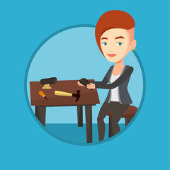 Shoemaker making handmade shoes in workshop.