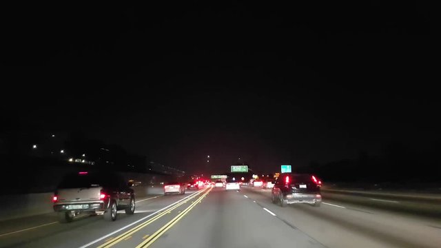 Driving on a road interstate 405 at night time, in Los angeles, California, in United states of America