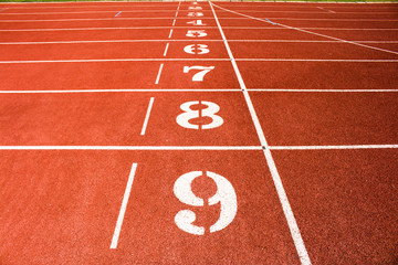 Red running track number background.