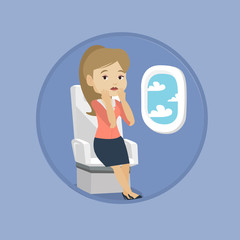 Young woman suffering from fear of flying.