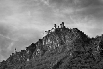 Italy- January, 2017 Old castle on a cliff top, a dangerous precipice, rock, forest, beautiful...