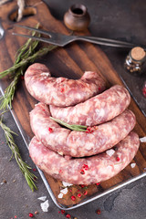 Raw sausages with spice