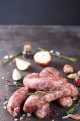 Raw sausages with spice