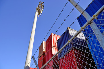 Fototapeta premium Wire mesh fence enclosing the container yard 