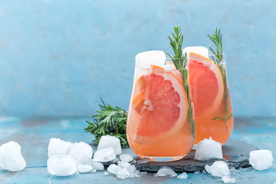 Grapefruit And Rosemary Gin Cocktail, Refreshing Drink With Ice