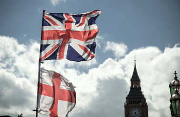 Obraz na płótnie Canvas British Union Jack flag blowing in the wind.