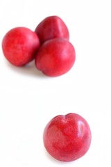 Fresh Plum on White Background