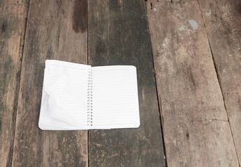 notebook crumpled paper wrinkled blank  white  on the desk, business concept