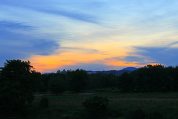 Fototapeta na wymiar sunset colorful and silhouette woodland, twilight in nature