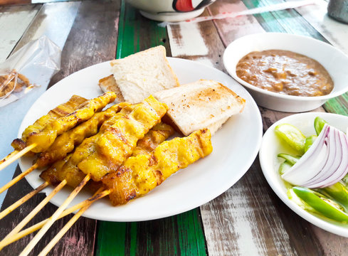 Grilled pork satay with peanut sauce and toast, Thai food