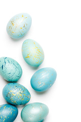 Blue Speckled Easter Egg with copy space for text. isolated on white background