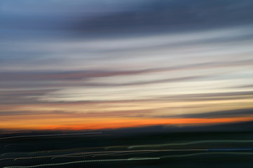 motion blurred line sky in sunset abstract nature blur background.